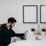 man working on laptop