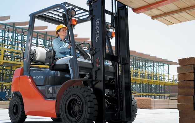 Women driving Sun Equipment Forklift