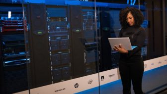 Woman checking her laptop for data