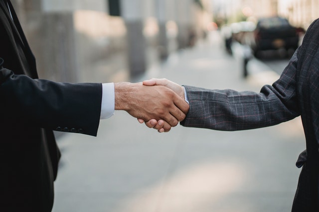 Businessman shaking hand with applicant