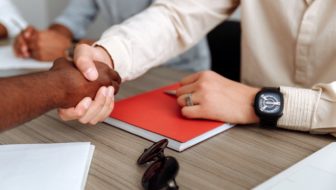 Man congratulating its client for setting up a limited company