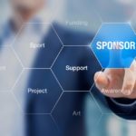 A man clicking at sponsor with his finger.