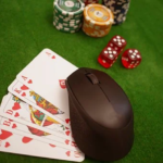 Poker game being played with cards,dice and coins.