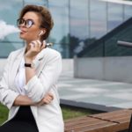 Woman smoking in the office premises.