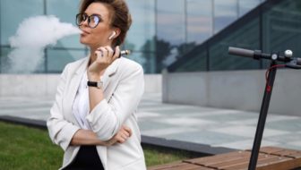 Woman smoking in the office premises.