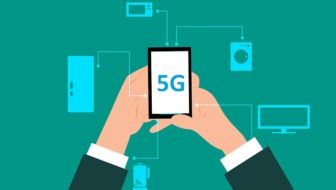 A man holding a phone with 5G network.