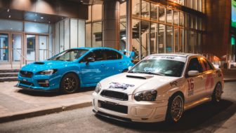 Company cars being parked outside the offices.