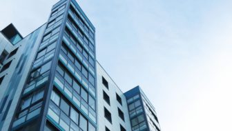 A tall building made up of steel.