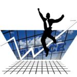 A man jumping high up in excitement,