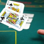 Players playing online gambling with cards.