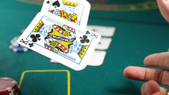 Players playing online gambling with cards.