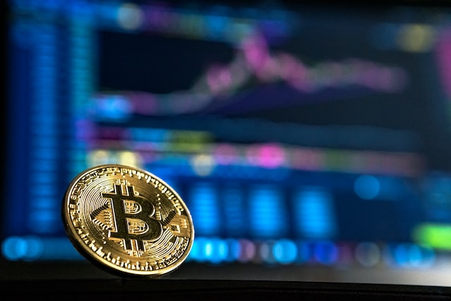 A golden bitcoin with B in black.