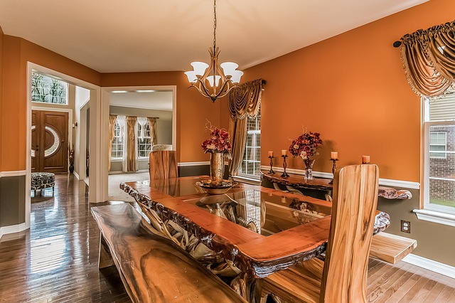 A dining area with stunning tables, chairs, and timeless decoration pieces! 