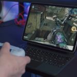 A boy playing online games with a controller.