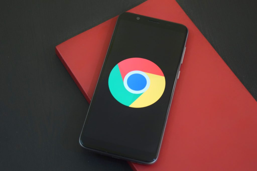 A mobile with Google chrome logo.