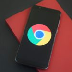 A mobile with Google chrome logo.