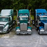 Variety of cars being parked for shipping.