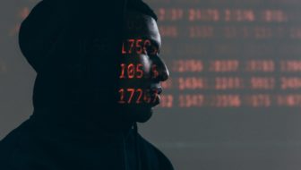 A man trying to steal data.