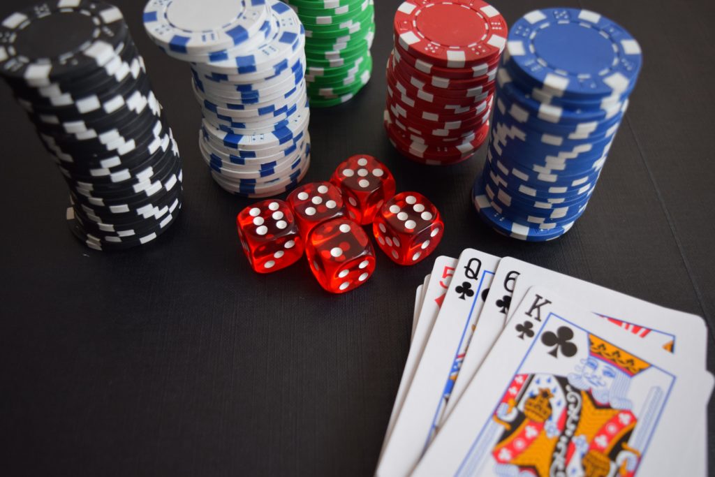 Players playing gambling games in online casino.