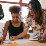 An entrepreneur sharing the ideas with her team.