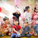 Cute kids dressed in beautiful clothes.