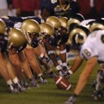 The Football players with helmets.