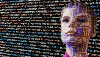 Human with software language displayed on screen.