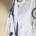 Healthcare professional in uniform.