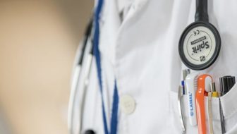 Healthcare professional in uniform.