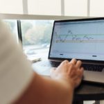 A man checking the crypto graph.