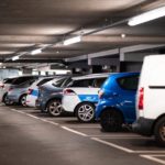 A fleet of cars parked in the parking area.