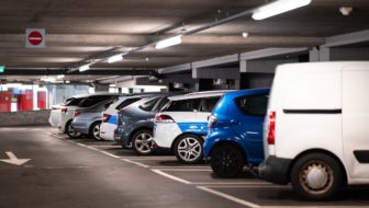 A fleet of cars parked in the parking area.