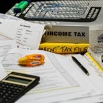 Income tax documents and a calculator.