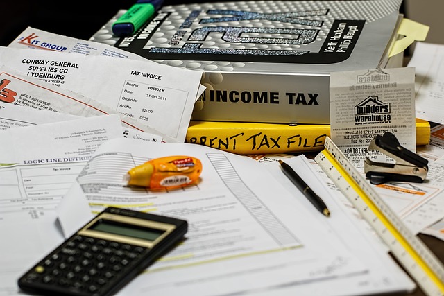 Income tax documents and a calculator.