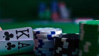 Cards and coins for gambling.