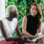 Two woman having a chat.