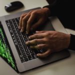 A man conducting cyber attack.