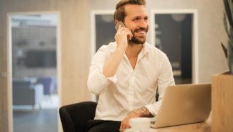 A man talking over the phone.