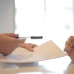 A MAN APPLYING FOR LOAN.