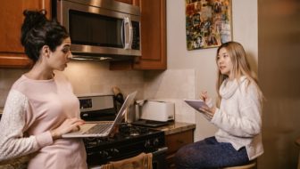 Two women working from home.