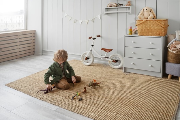 baby playing on rugs