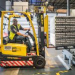 Use Stackable Storage Containers to Combat Distribution Center Challenges