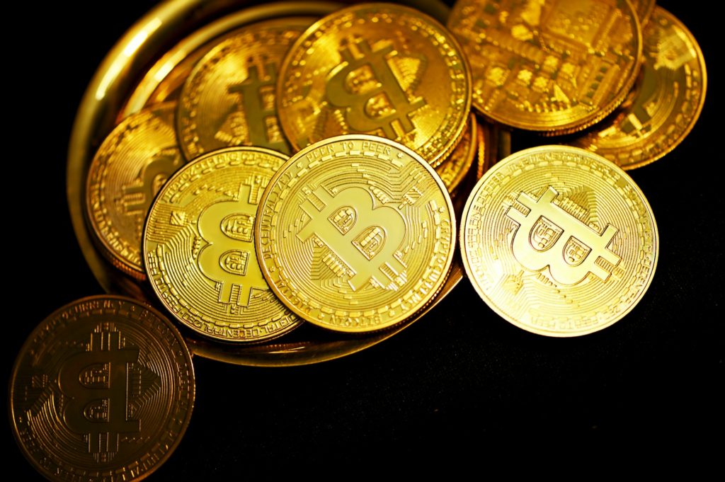 Overhaul of Digital Rights Management through Bitcoin