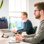 A team in an office researching digital customer service during a meeting