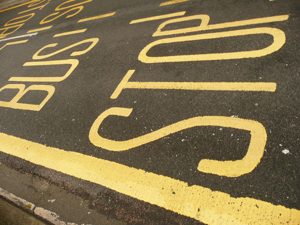 Bus Stop - yellow letters on the street